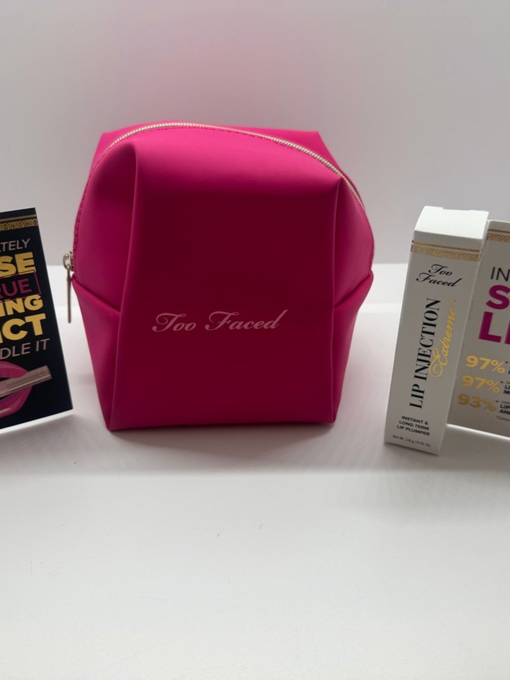 Too Faced Bright Pink Cosmetic Case with lip injections